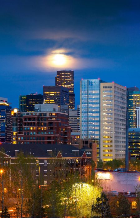 13706484 - denver skyline at dusk with the full moon rising above